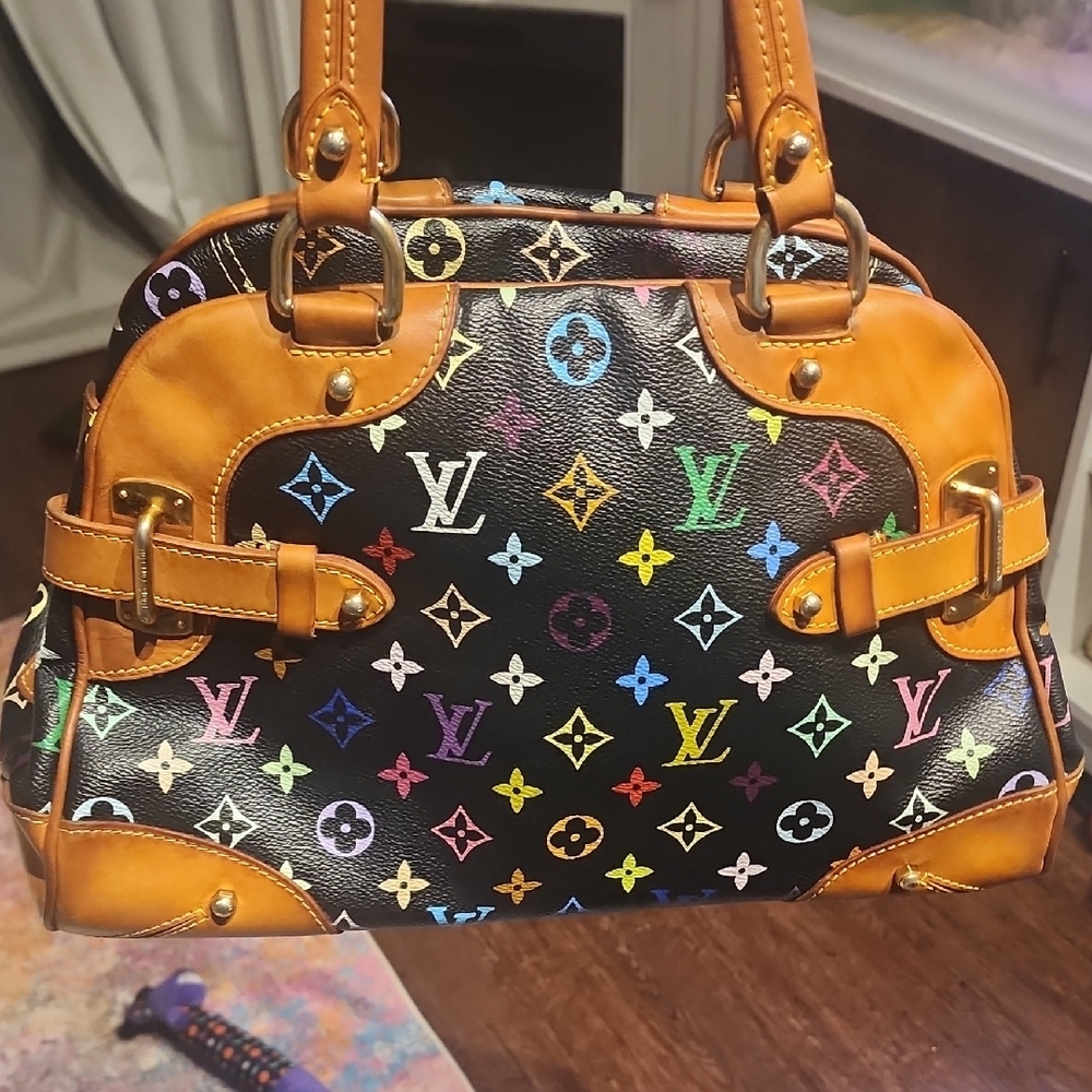 Louis Vuitton Black and Tan Satchel with Iconic Design